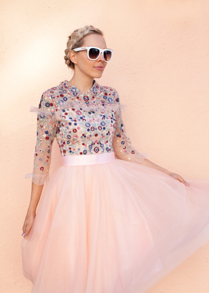 Embroidered dress paired with blush tulle skirt
