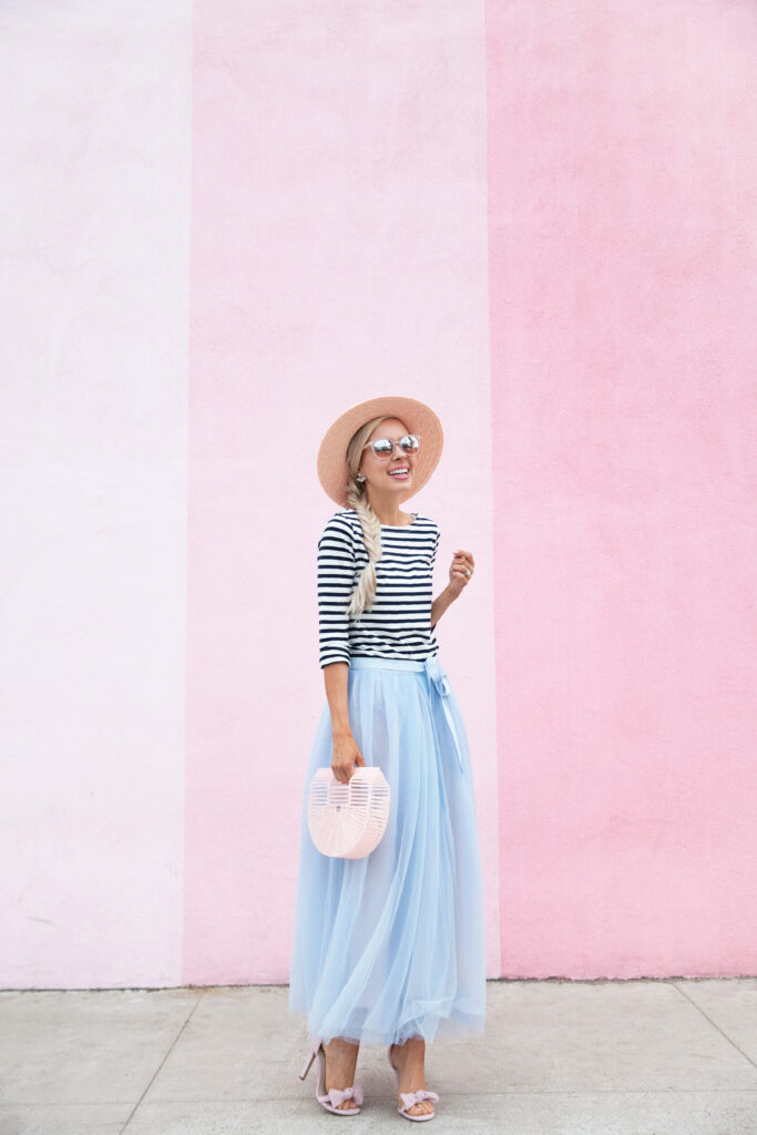 j crew tulle skirt striped shirt pigment san diego wall | Tulle Ball Skirt featured by top San Francisco fashion blog, Lombard and Fifth: image of a woman wearing a JCrew striped turtleneck, JCrew blue tulle ball skirt, H&M pink heels, pink Gaia bag and ASOS straw boater hat