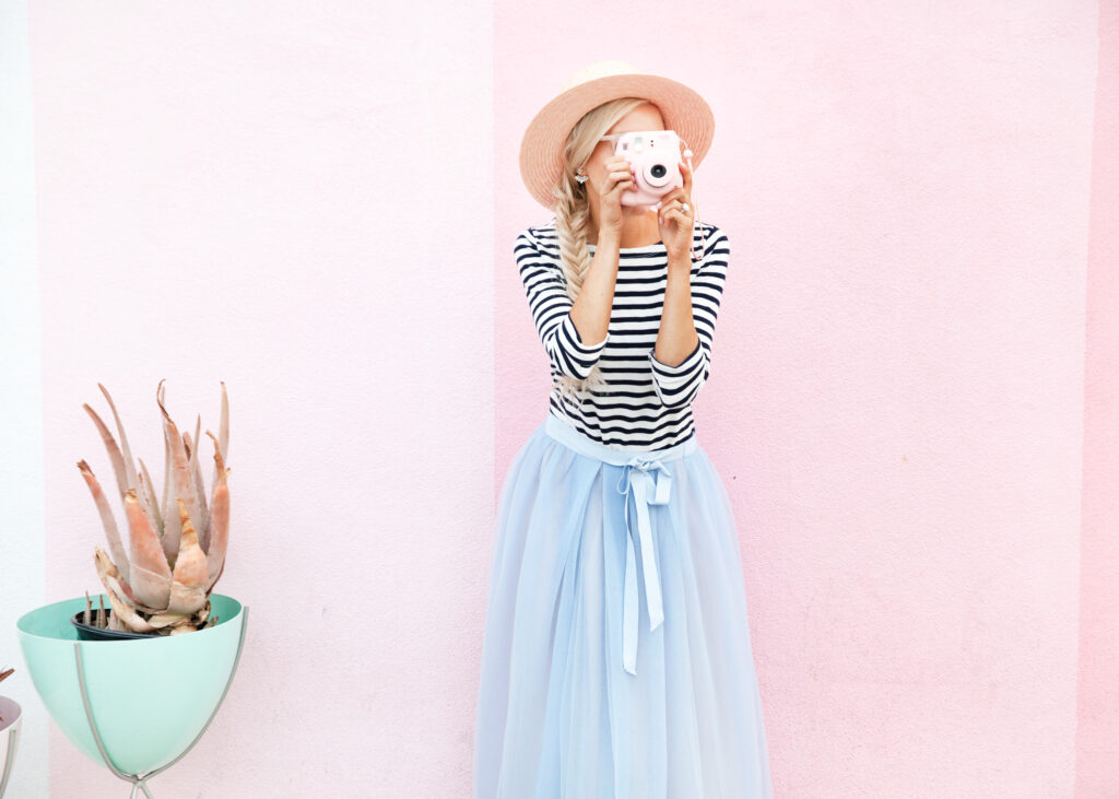 j crew tulle skirt striped shirt pigment san diego wall | Tulle Ball Skirt featured by top San Francisco fashion blog, Lombard and Fifth: image of a woman wearing a JCrew striped turtleneck, JCrew blue tulle ball skirt, H&M pink heels, pink Gaia bag and ASOS straw boater hat