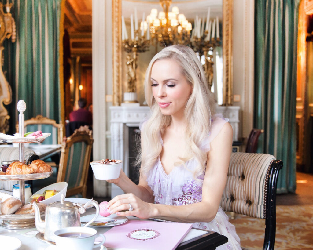| Brunch at Laduree Paris featured by top San Francisco fashion blog, Lombard & Fifth: image of a blonde woman wearing Needle & Thread rainbow gown, Stuart Weitzman sandals and GAP pink faux fur coat