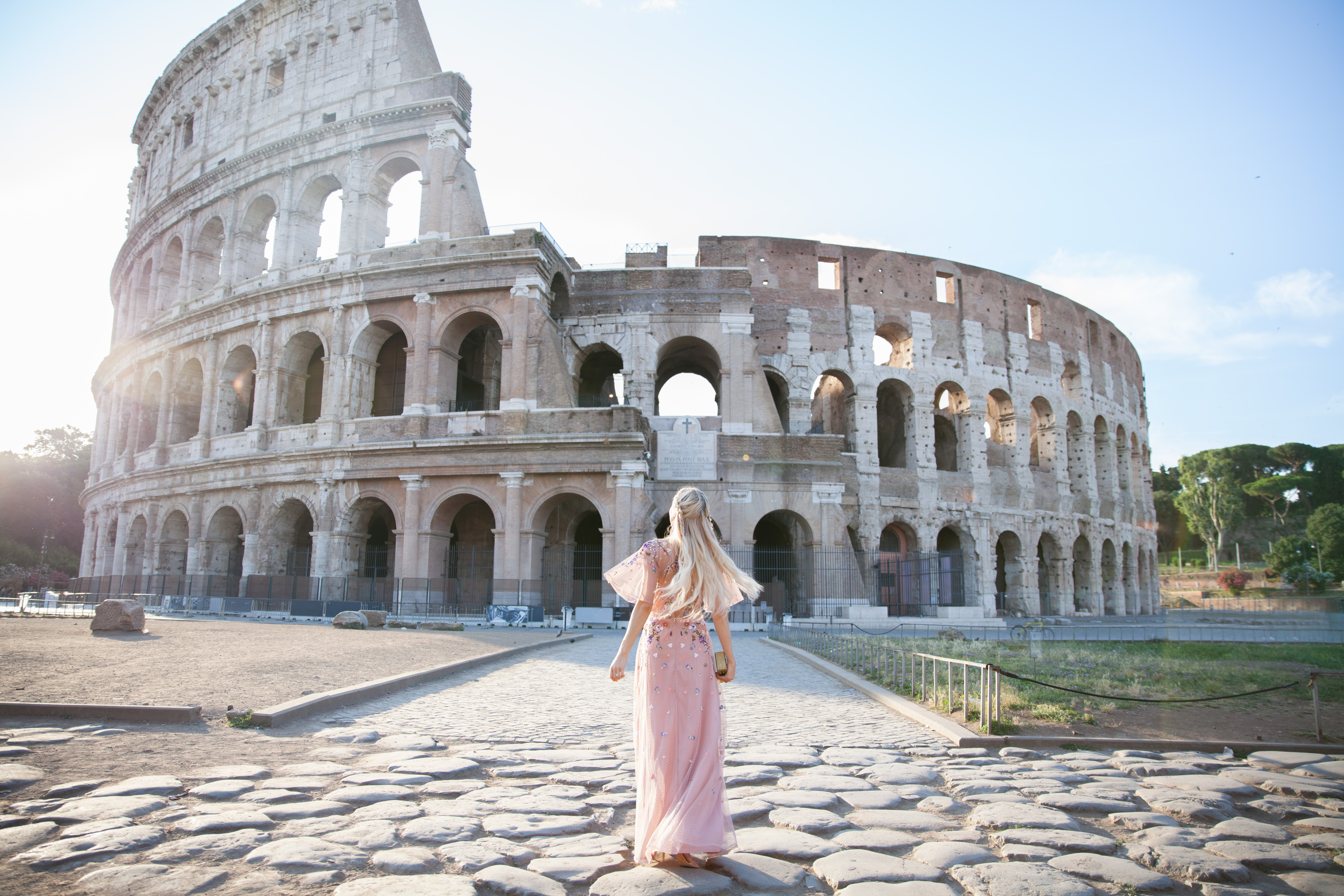 ASOS DESIGN Bridesmaid floral embroidered dobby mesh flutter sleeve maxi dress in Rome  | ASOS floral embroidered maxi dress featured by top San Francisco fashion blog, Lombard and Fifth: image of a blonde woman wearing a floral maxi dress at the Colosseum in Rome