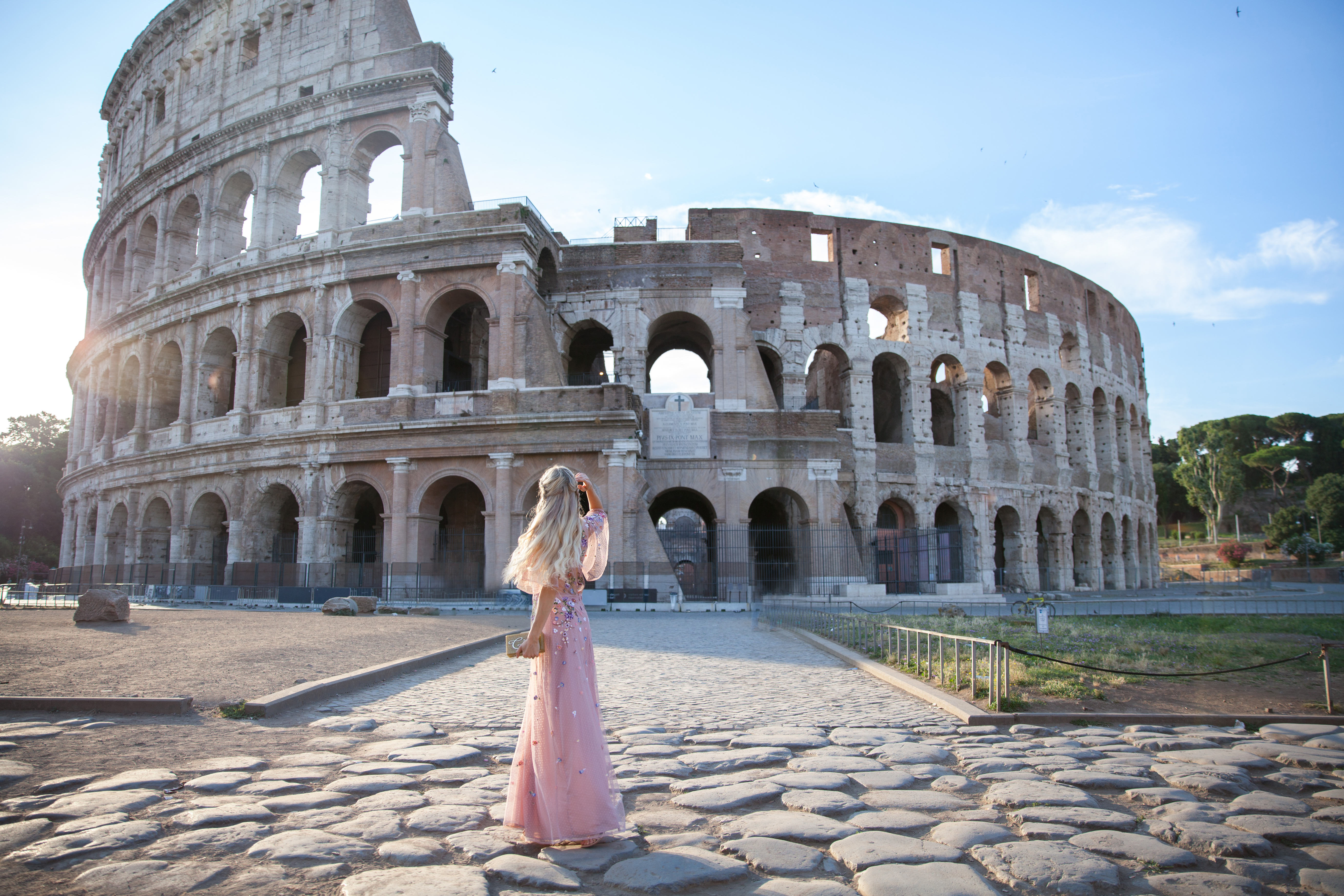 Colosseum_asos embroidered dress Rome | ASOS floral embroidered maxi dress featured by top San Francisco fashion blog, Lombard and Fifth: image of a blonde woman wearing a floral maxi dress at the Colosseum in Rome