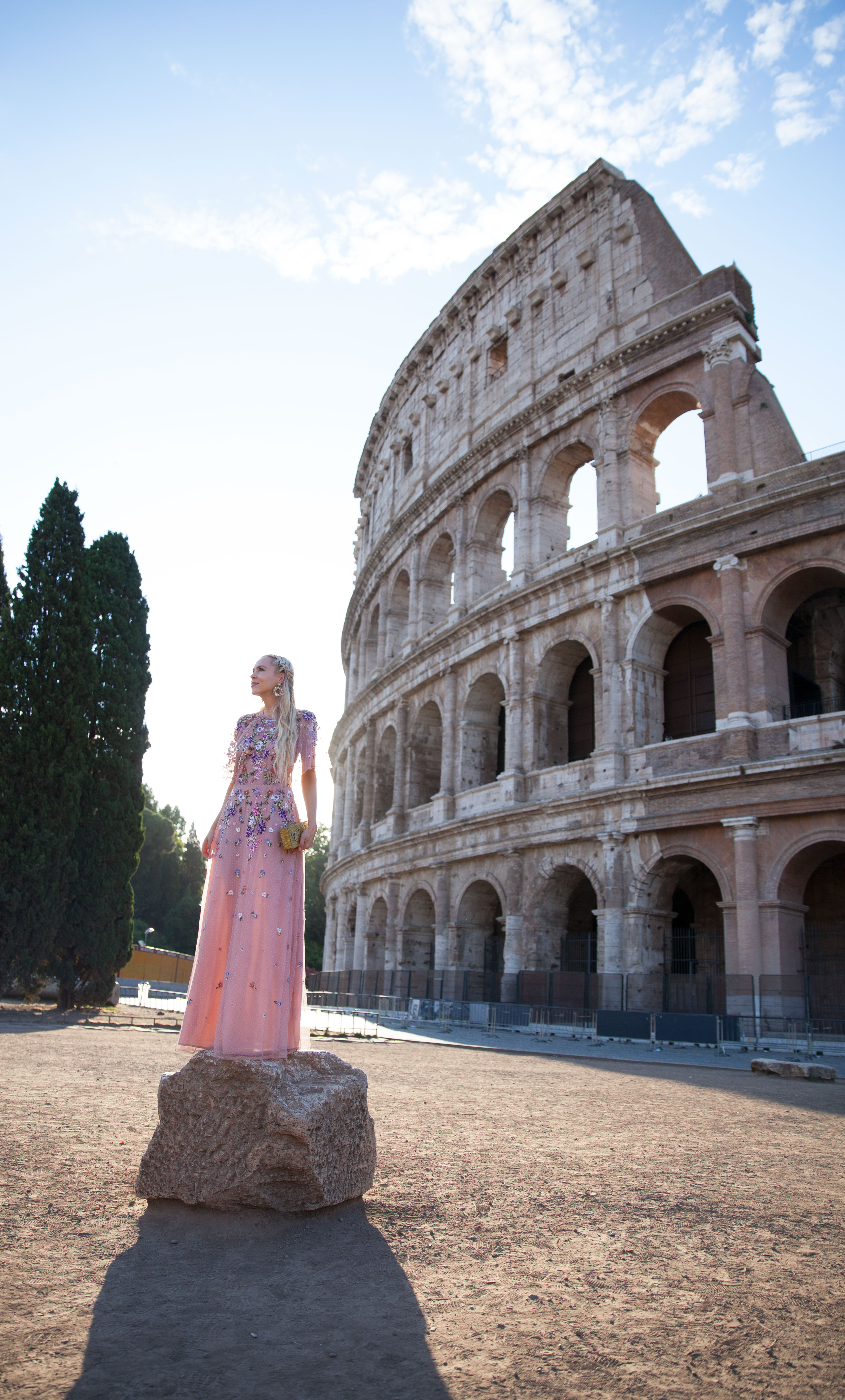 ASOS DESIGN Bridesmaid floral embroidered dobby mesh flutter sleeve maxi dress in Rome  | ASOS floral embroidered maxi dress featured by top San Francisco fashion blog, Lombard and Fifth: image of a blonde woman wearing a floral maxi dress at the Colosseum in Rome
