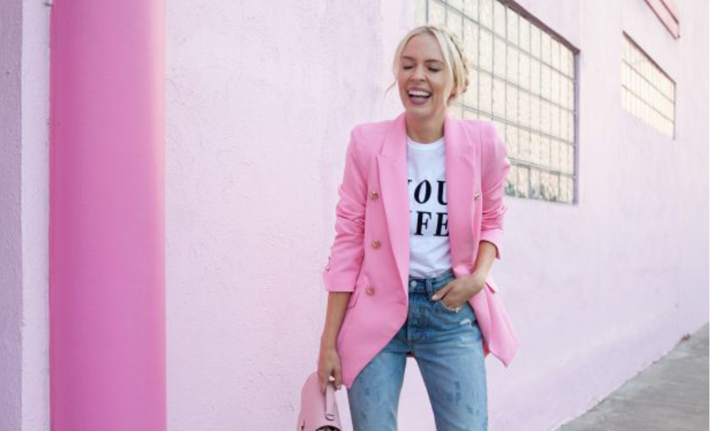 Pink fashion favorites featured by top San Francisco fashion blog, Lombard and Fith: image of a blonde woman wearing a RIver Island pink blazer, denim jeans, pink flats and a pink handbag