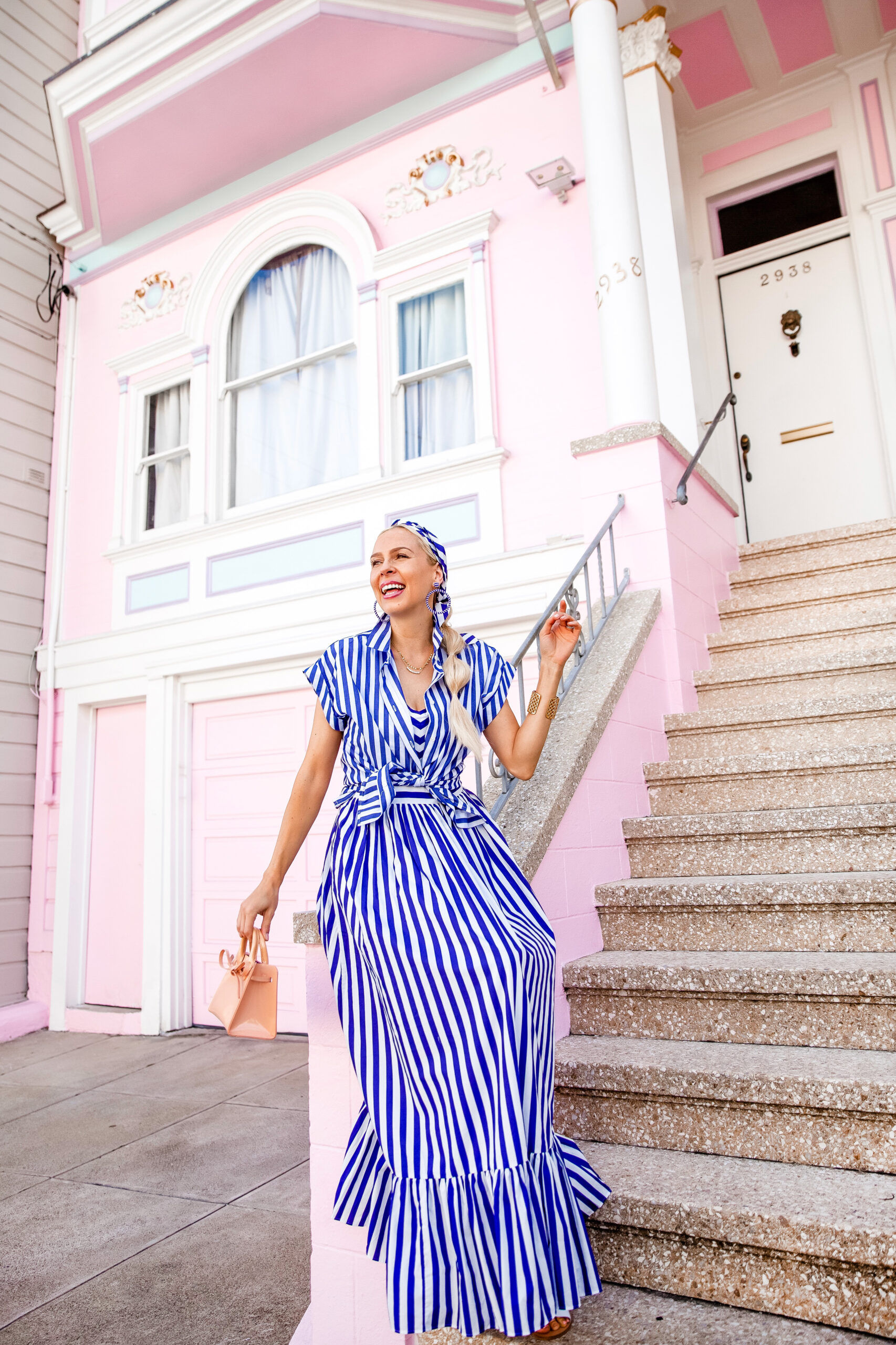 National Striped Day featured by top US fashion blog, Lombard & Fifth: image of a woman wearing a Crew striped maxi dress, JCrew beaded hoops, Mansur Gavriel mini sun bag, Steve Madden Greece sandals