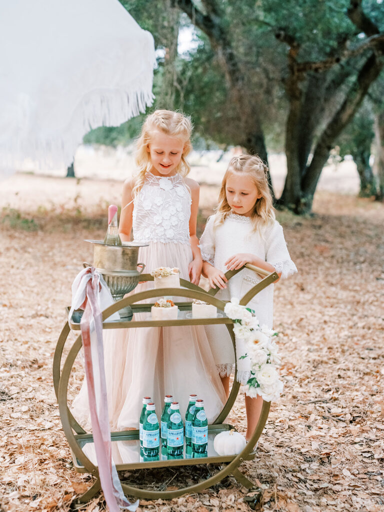 Whimsical boho picnic photoshoot ideas, with family in an outdoor location, featured by San Francisco fashion blogger Lombard & Fifth.