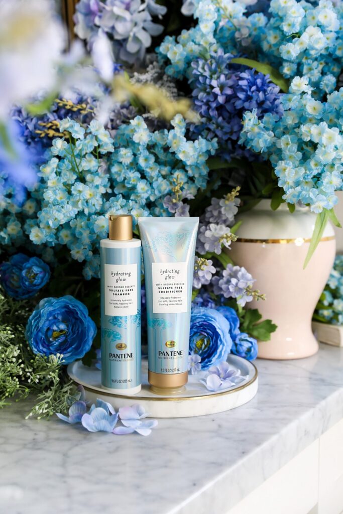 Best shampoo for dry hair by Pantene Hydrating Glow, and blue floral photoshoot styling inspiration by fashion blogger Lombard & Fifth.