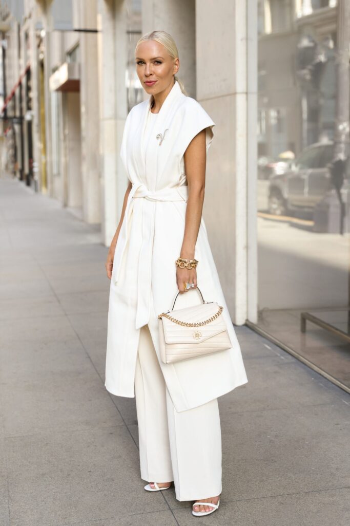 Neutral fall favorites from H&M, style inspiration. Sleeveless ivory long coat, monochromatic look, by Lombard & Fifth Veronica Levy.