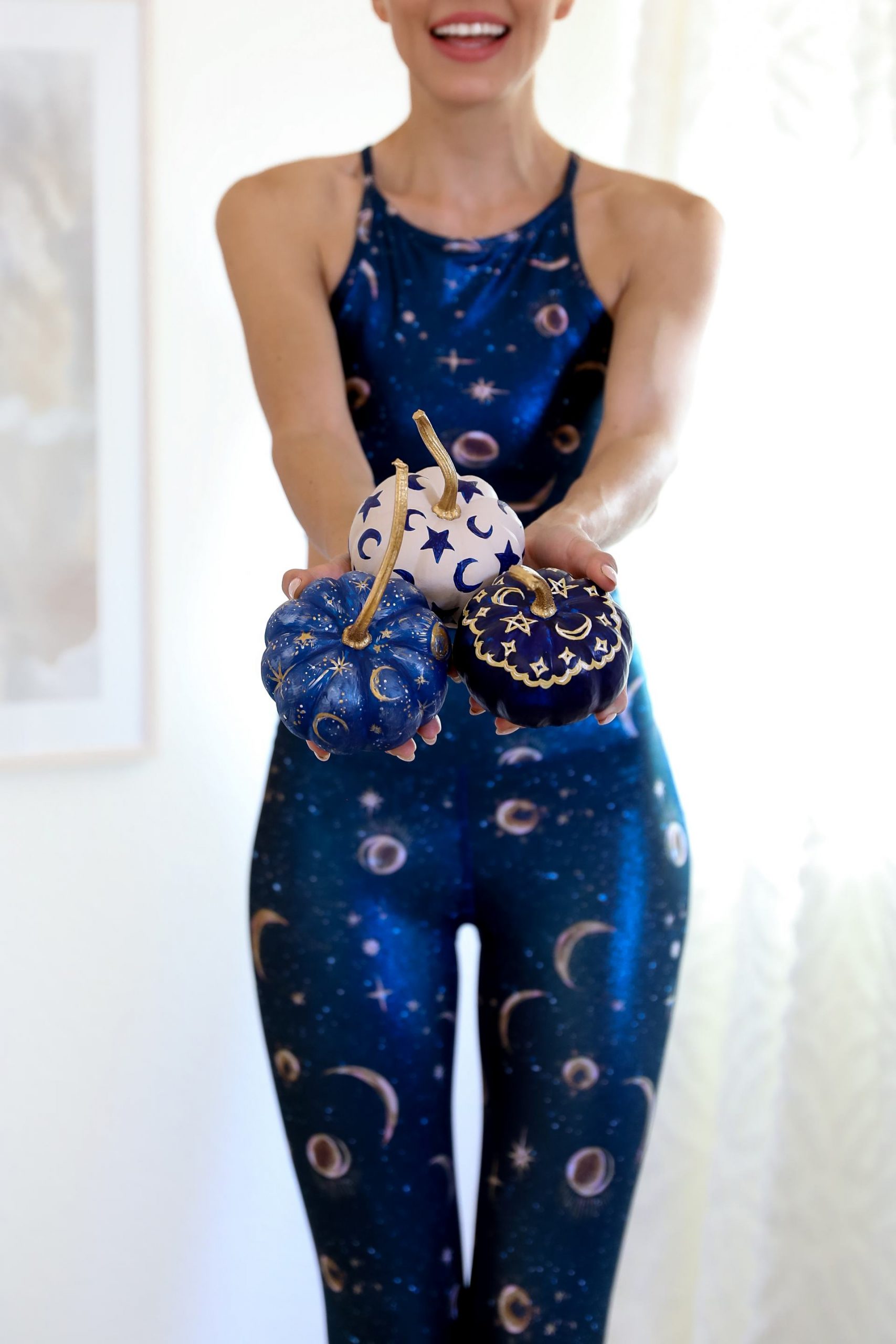 Pumpkin décor inspiration, featuring Beach Riot’s new celestial collection leggings and sports bras. Handmade Fall and Halloween décor by Lombard & Fifth, Veronica Levy.