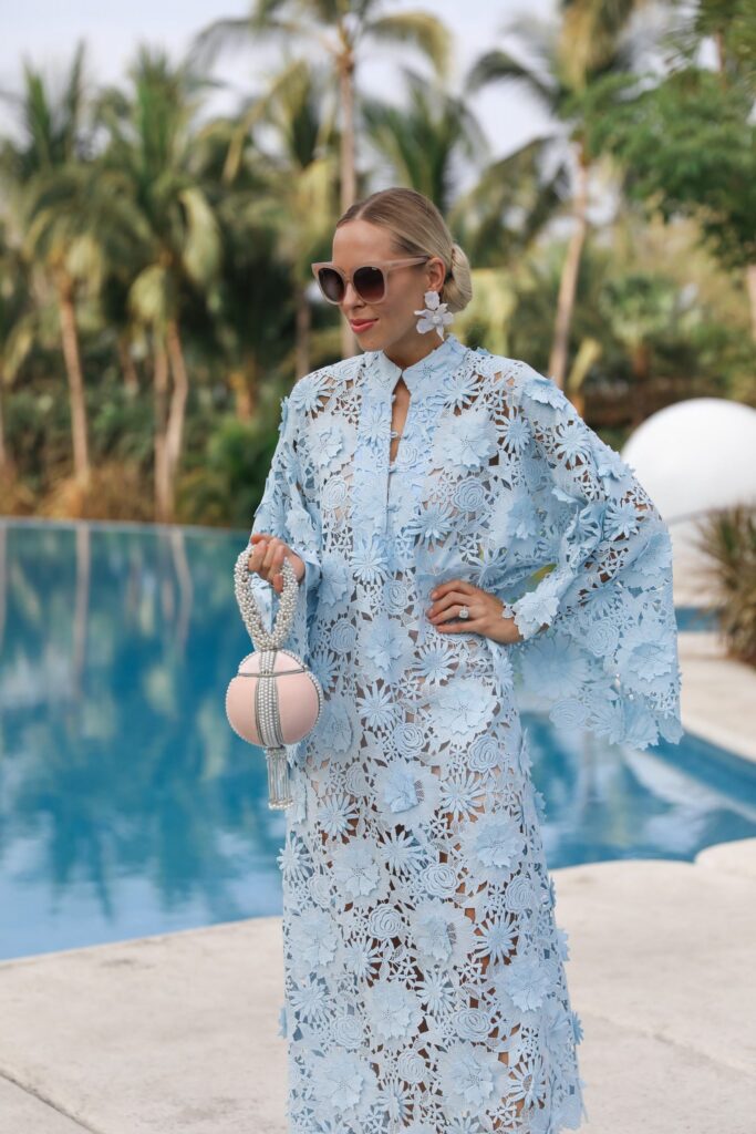 Resort style inspiration La Vie Style House Guipure-lace kaftan blue and what to wear on tropical location. By Veronica Levy Lombard & Fifth.