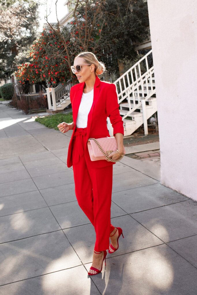 Red Express blazer trousers suit with Zara blue coat, layers for winter. By Lombard & Fifth, Veronica Levy.