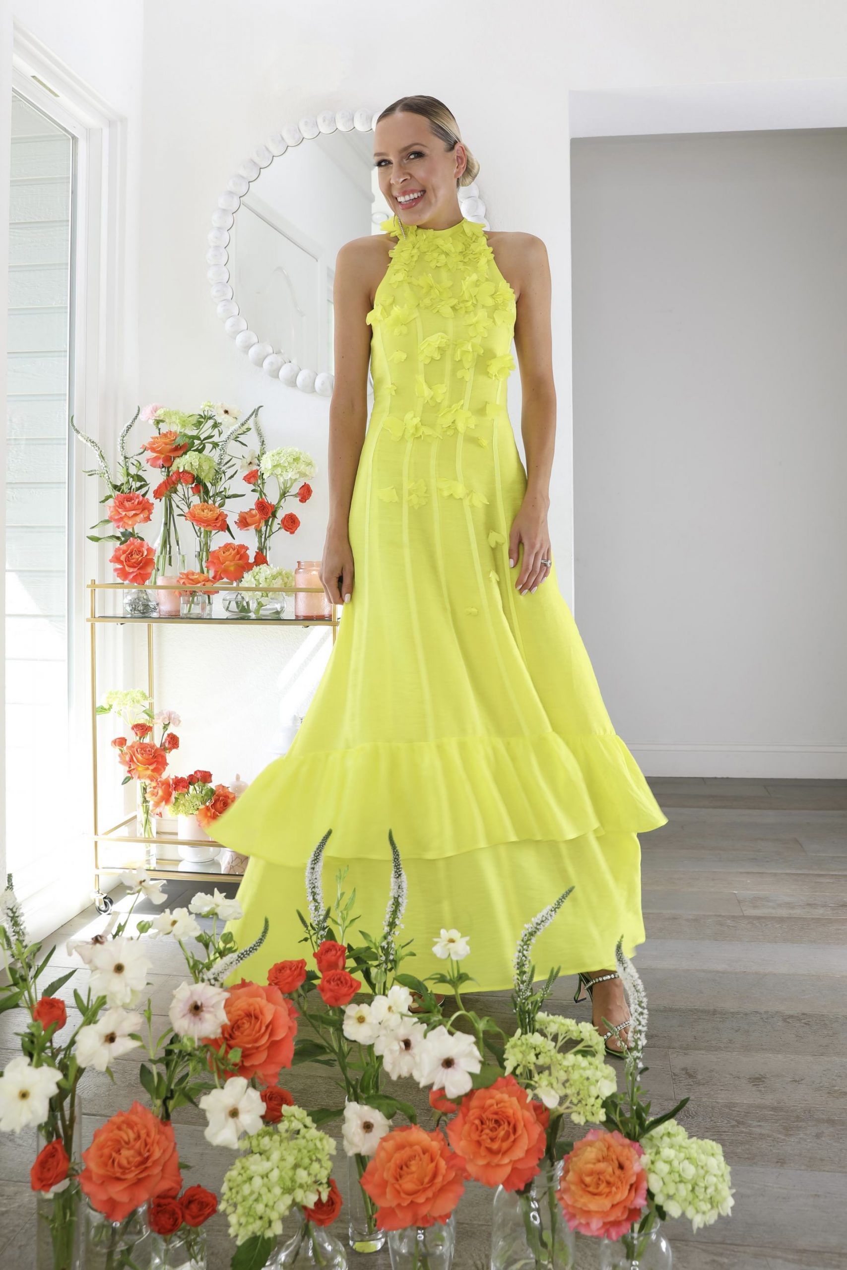 Karen Millen spring summer style featuring colorful dresses in neon, orange and floral print. Floral design inspiration by Veronica Levy, Lombard & Fifth.