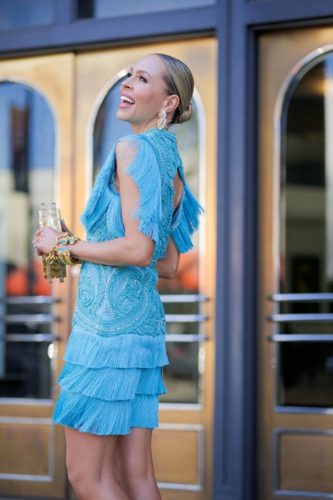 Karen Millen fringe teal mini dress sale and more fringe trend style inspiration. By Veronica Levy Lombard & Fifth.