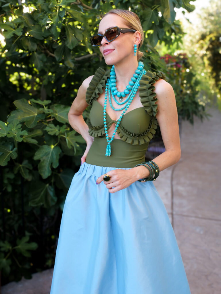 Tuckernuck and BaubleBar inspired turquoise fashion accessories styled with feminine resortwear and colorful summer clothing.
