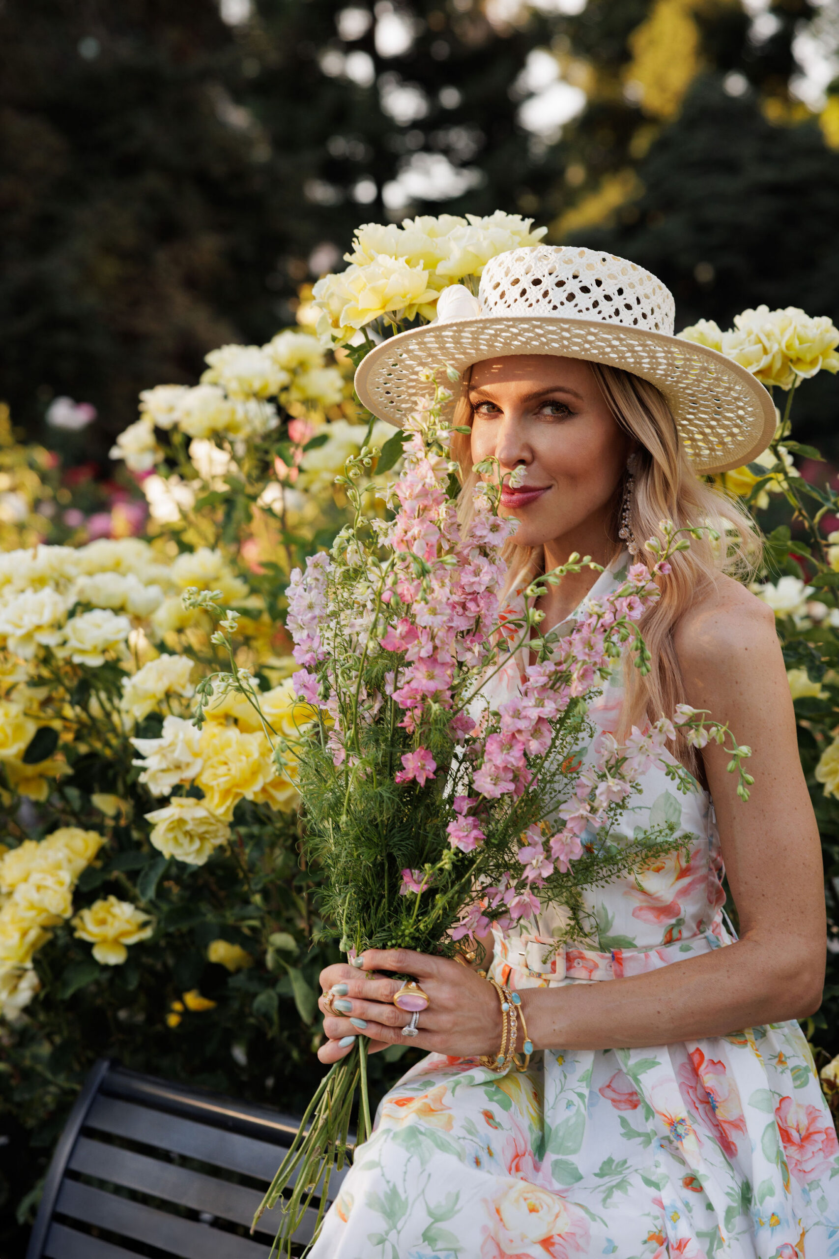 Elegant garden party fashion featuring a feminine floral midi dress