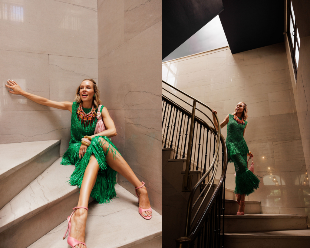 Green fringe dress styled with a pink fringe handbag and pink sandals for a colorful summer outfit.